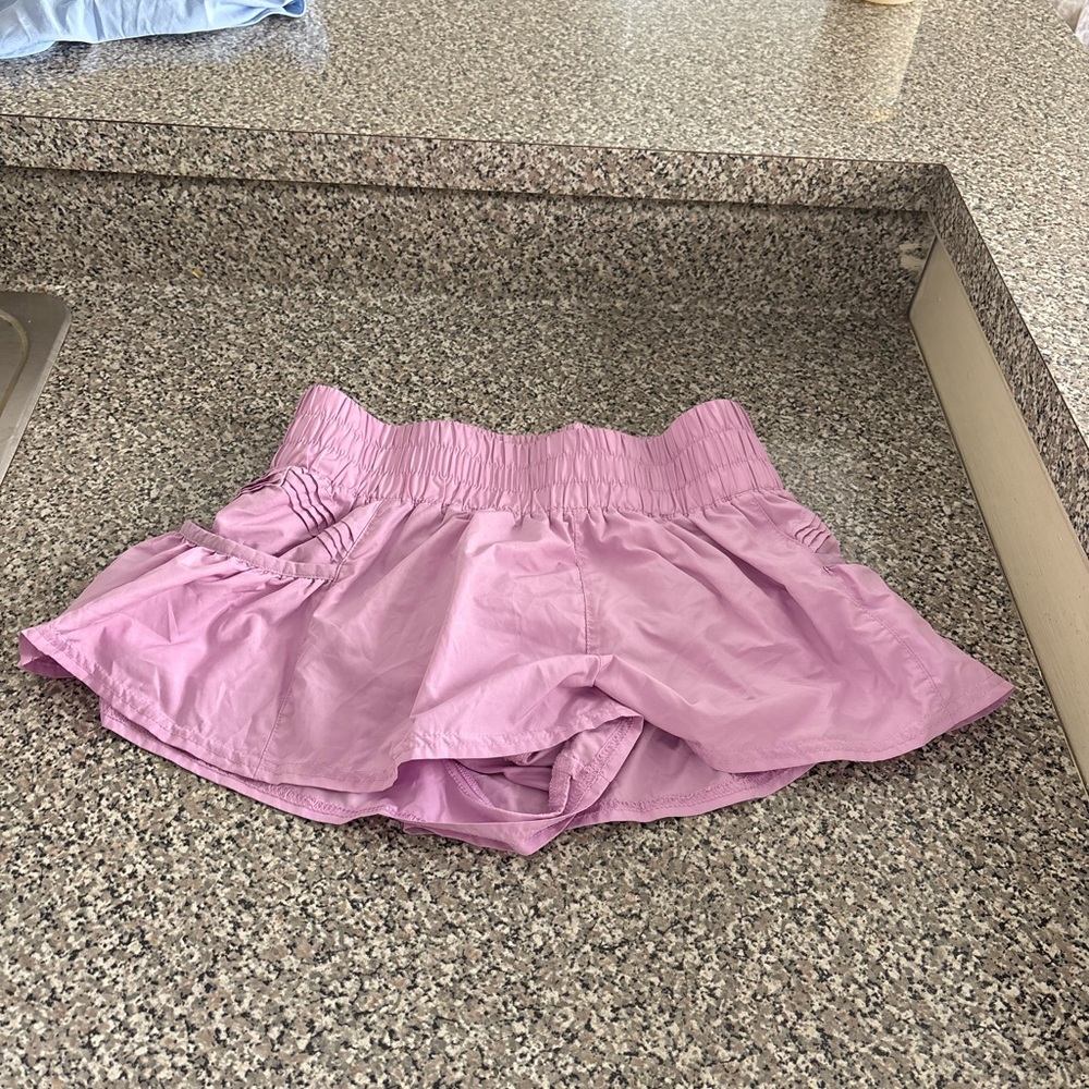 Pink free people running shorts